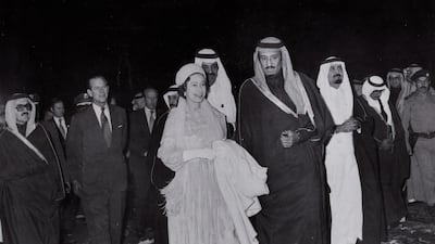 The album of 39 photos was taken during the queen and Prince Philip's six-nation tour of Gulf States. In this photo, they are being officially welcomed by King Khalid of Saudi Arabia.