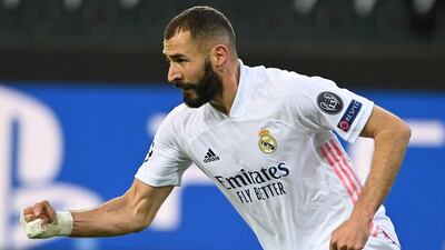 Real Madrid forward Karim Benzema pulls a goal back. AFP