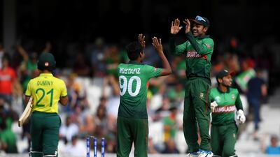 Bangladesh fast bowler Mustafizur Rahman celebrates taking the wicket of South Africa batsman JP Duminy. Alex Davidson / Getty Images
