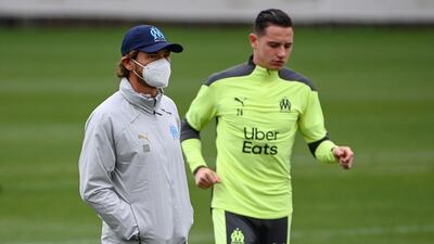 Andre Villas Boas and Florian Thauvin. AFP
