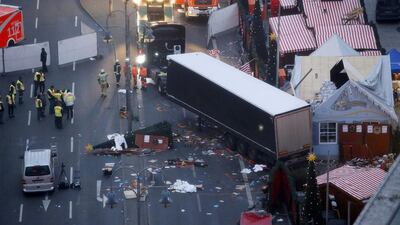 Rescue workers tow the lorry that ploughed into a crowded Christmas market in the German capital on December 20, 2016. Fabrizio Bensch Fabrizio Bensch / Reuters