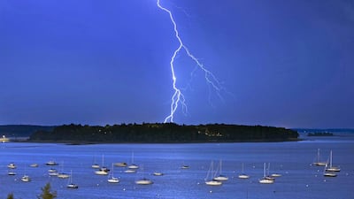 Lightning strikes north of Macworth Island in Portland, Maine. Robert Bukaty/AP