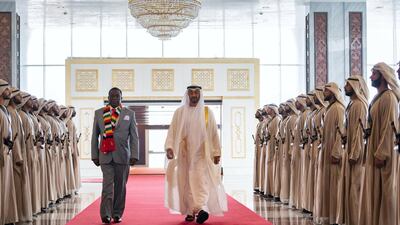 Sheikh Mohamed bin Zayed, Crown Prince of Abu Dhabi Deputy Supreme Commander of the UAE Armed Forces, receives Emmerson Mnangagwa, President of Zimbabwe, at the Presidential Airport. Ryan Carter for the Ministry of Presidential Affairs