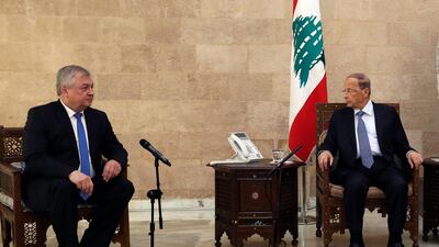 Russia's special presidential envoy to Syria Alexander Lavrentiev, left, meets with Lebanese President Michel Aoun in Beirut, Lebanon, Thursday, July 26, 2018. Dalati Nohra via AP