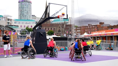 The Canadian team train during a 3x3 wheelchair basketball practice session at the Smithfield site. AP