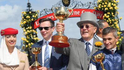 Trainer Joseph O'Brien, owner Lloyd Williams and Corey Brown pose with Melbourne Cup. Vince Caligiuri / Getty Images
