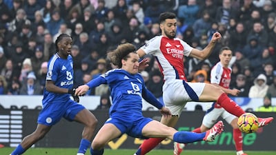 Leicester City defender Wout Faes vies for the ball with Arsenal's Mikel Merino. AFP