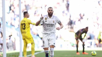 Real Madrid's striker Karim Benzema celebrates after scoring a goal during the Spanish La Liga soccer match between Real Madrid CF and Real Valladolid at Santiago Bernabeu in Madrid, Spain, 02 April 2023. EPA
