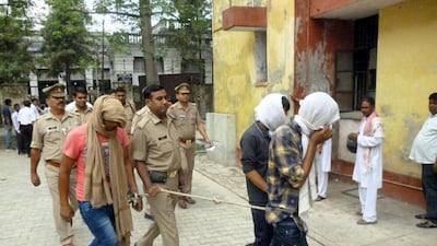 Three men suspected of sexual assault to court in the Indian state of Uttar Pradesh on May 29, 2017. Sexual harassment is widespread in India but an online campaign launched in October 2017 to name alleged offenders at universities has come in for criticism because their accusers remain anonymous. AFP
