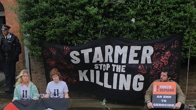 Members of Youth Demand protest outside the London home of Labour leader Keir Starmer on Tuesday. PA