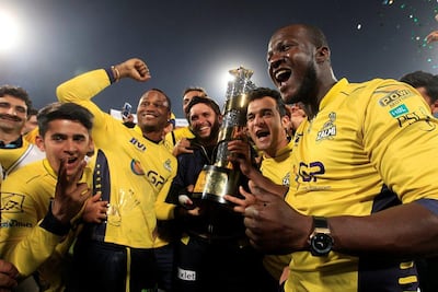Darren Sammy, right, captained Peshawar Zalmi to the 2017 PSL title, winning the final in Lahore. Faisal Mahmood / Reuters
