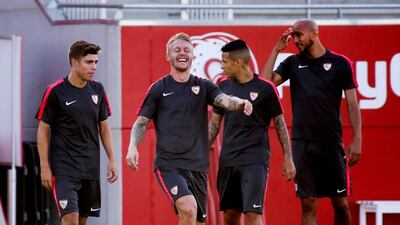 Sevilla players including Danish defender Simon Kjaer, centre, takes part in a training session in Sevilla, Spain ahead of Sunday's Spanish Supercopa match against Barcelona at Stade Ibn Battouta in Tanger, Morocco. EPA