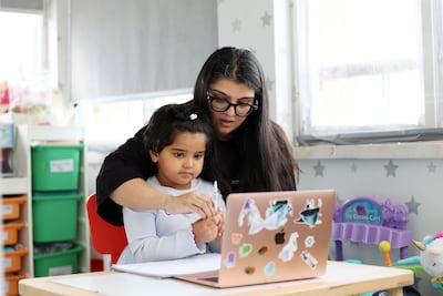 Dr Anam Akhter Noorani with her four-year-old daughter Aida. Chris Whiteoak / The National