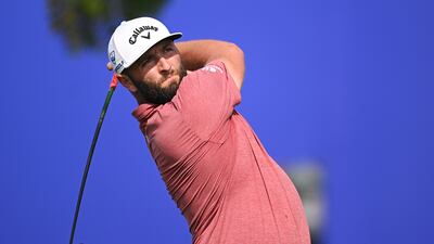 Jon Rahm of Spain tees off on the 14th hole. Getty Images