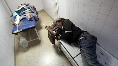Migrants who were injured in a car crash sleep on beds in a hospital room in Beni Walid, 170 kilometres southeast of the capital Tripoli, on February 14, 2018. AFP