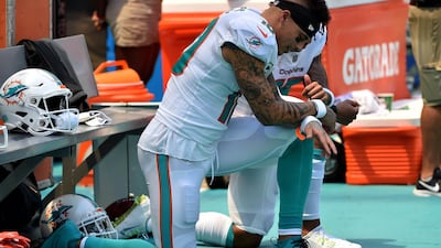 Kenny Stills, left, and Albert Wilson both kneel during the United States national anthem on the NFL opening Sunday, on September 9, 2018. USA Today