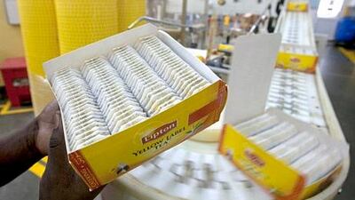 Dubai - JuLY 4, 2011 - Boxes of Lipton tea bags roll along the conveyor line inside the Unilever/Lipton tea factory in the Jebel Ali Free Zone in Dubai, July 4, 2011. The factory produces 1.1 million tea bags per hour, 365 days a year and is the second largest tea producing plant in the world for Unilever. (Photo by Jeff Topping/The National)