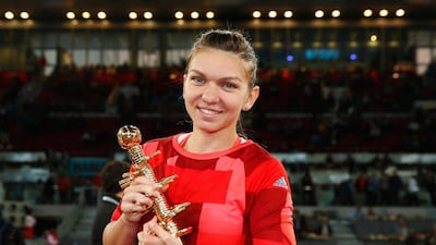 Sticking with tennis, what you see in Simona Halep's hands is the Madrid Open trophy. It is in the shape of a staff with small racquets coming out of the it and which includes names of some of the greats to have graced the game, including Roger Federer and Serena Williams. Getty Images