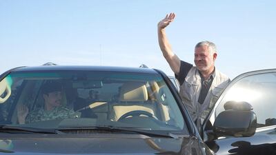 King Abdullah II of Jordan waves to well-wishers as his son, Crown Prince Hussein, sits in his car. Photos from Royal Court
