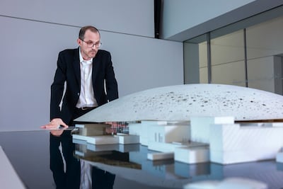 The iconic design by Jean Nouvel has become one of the defining symbols of the capital's skyline. Victor Besa / The National