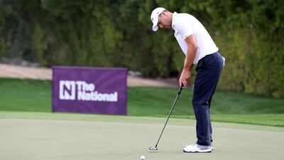 Martin Kaymer putts on the 12th green. Chris Whiteoak / The National