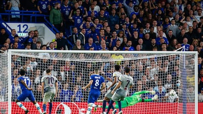 Raheem Sterling curls home Chelsea's goal. EPA