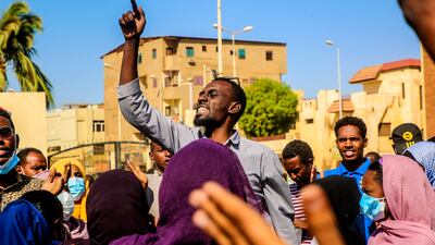 A protester shouts slogans during a march in Khartoum. EPA
