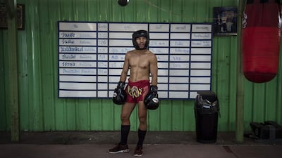 World Boxing Council (WBC) mini-flyweight champion, Wanheng Menayothin, waiting to spar during a training session in Bangkok. Lillian Suwanrumpha / AFP