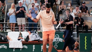 Novak Djokovic dances after clinching victory over Giovanni Mpetshi Perricard in the men's singles of the French Open tennis tournament at Roland-Garros, Paris. AFP
