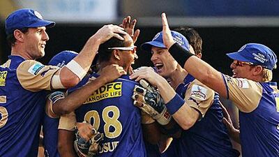 Yusuf Pathan of Shane Warne's Rajasthan Royals is congratulated by teammates after taking a wicket in this year's IPL.
