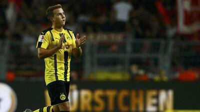 Borussia Dortmund forward Mario Gotze applauds the crowd as he leaves the field against Freiburg on Friday, September 23, 2016. Thilo Schmuelgen / Reuters