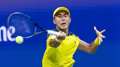 Australia's Rinky Hijikata hits a return against Spain's Rafael Nadal. AFP