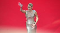 American actress and professional kiteboarder Maika Monroe in a metallic silver gown by Saudi label Ashi Studio at Cannes Film Festival 2026. AFP