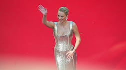 American actress and professional kiteboarder Maika Monroe in a metallic silver gown by Saudi label Ashi Studio at Cannes Film Festival 2026. AFP