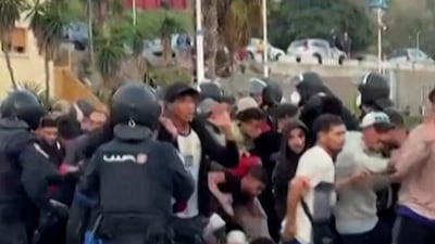 Spanish police move migrants from Ceuta beaches