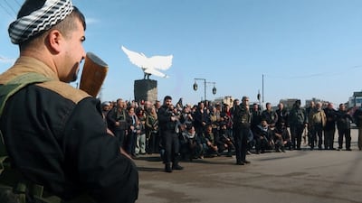 Kurdish-led forces agree to join central army in Syria power shift