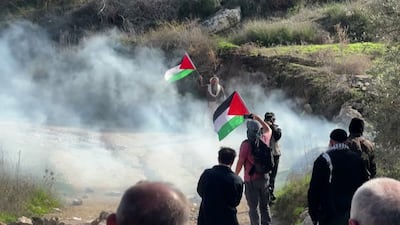 Israeli troops disperse Palestinians protesting against settlements in occupied West Bank