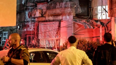Iranian cluster bomb strikes on central Israel injure 12