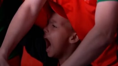 Moroccan fans celebrate their team's victory over Scotland