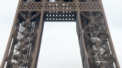Protesters display Palestinian flag on Eiffel Tower