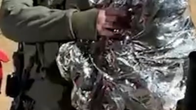 Israeli soldiers hand detained toddler over to Red Cross in Gaza