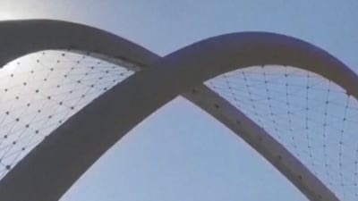 Iran dials up rhetoric as US withdraws staff from Qatar