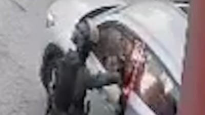 Israeli Border Police officer throws stun grenade into car