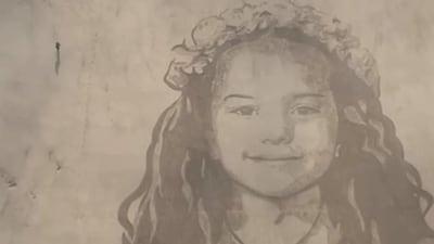 Giant portrait of Hind Rajab created on British beach