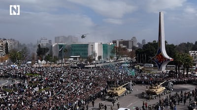 Paragliders and military parades in Damascus as Syrians celebrate anniversary of Assad's fall