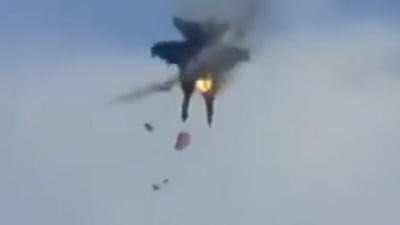 Fighter jet crews parachute to safety after collision
