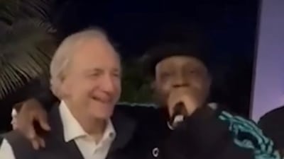 Ray Dalio raps with Wyclef Jean in Abu Dhabi