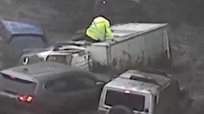 Severe flooding sweeps cars through streets in Chile