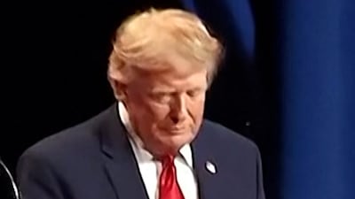 Trump jokes as child joins him on stage