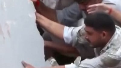 Dozens feared trapped after building collapse in Delhi